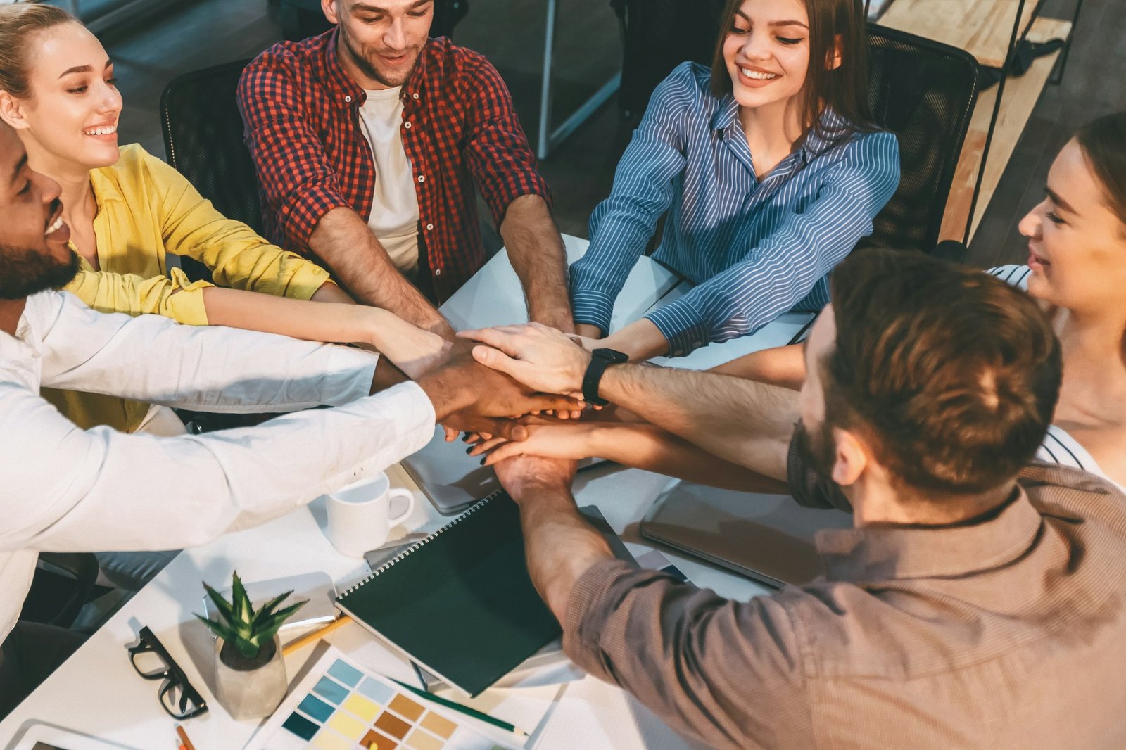 Enthusiastic Team Collaboration in Modern Office During Daytime